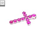a close up of a cross with pink stones on a white background