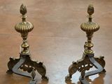 two candles that are sitting on a table