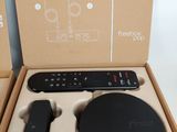 a box with a remote and a remote control in it