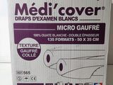 packaging of a box of medi cover with a purple and white design