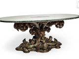 an image of a table with a glass top and a tree on it