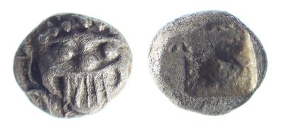 l'image d'une pièce de monnaie dont l'avers et le revers représentent chacun un visage