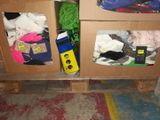 a wooden cabinet with a bunch of items inside of it