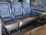 four seats in the back of a car that are empty
