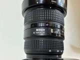 a close up of a camera with a lens on top of it