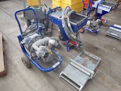 a blue machine that is sitting on the ground