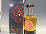 an image of a bottle of whisky next to a bottle of wine