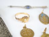 a gold ring with a stone in the middle of it