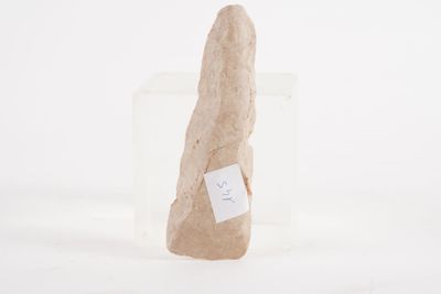 a rock with a sticker on it sitting in a clear box