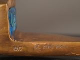 an image of a close up of a metal object on a table