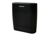 the bose bluetooth speaker is black and has a built - in microphone