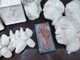 many different types of clay sculptures on the table