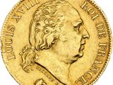 a gold coin with a portrait of a man in profile