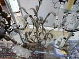a glass vase with a bunch of flowers inside of it