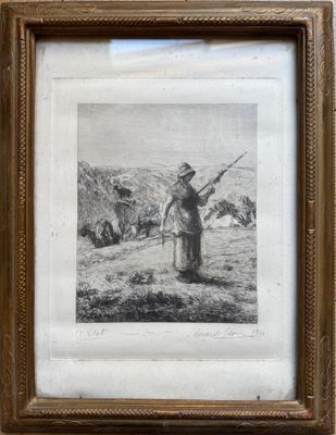 an old picture of a man with a gun in a field