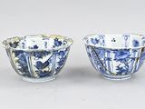 pair of chinese blue and white bowls with floral designs