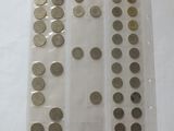 a lot of coins that are sitting on a table