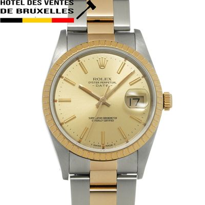 une montre Rolex en or et argent avec des chiffres romains