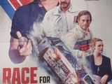 the poster for race for glory is displayed on a table