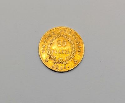 une image représentant une pièce d'or sur laquelle figure le chiffre vingt