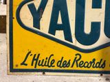 a yellow and blue sign that says yacc on it