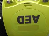 a yellow suitcase with a sign that says wed on it
