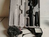 a box with a camera and a microphone inside of it