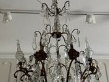 a chandelier hanging from the ceiling in a room