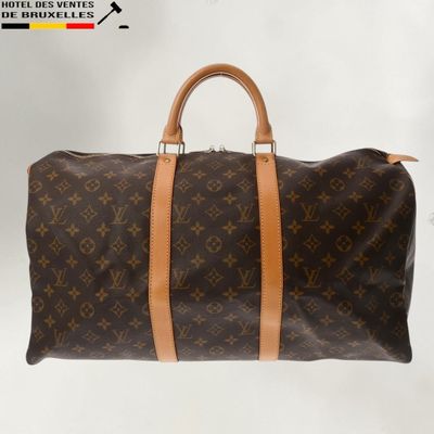 Sac Keepall Louis Vuitton en toile Monogram et cuir