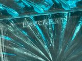 a close up of a glass vase with a starburst design
