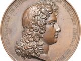 une image montrant un gros plan d'une pièce de monnaie sur laquelle figure le visage d'une femme