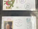 two envelopes with a picture of a man and a woman on them
