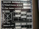 a sign on the side of a building that says charot elevator automote