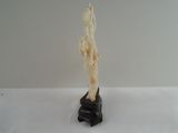 a sculpture of a plant that is on top of a table