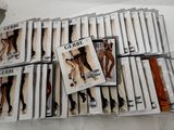 a lot of cds that are stacked on a table