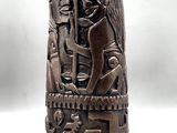 a close up of a statue of a woman and a man on a pedestal
