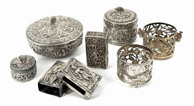 an image of a group of silver objects on a white surface