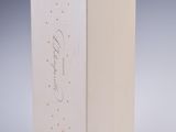 a white box with a gold star design on it