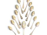 a lot of spoons that are arranged in a circle
