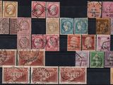 an image of a collection of old stamps on a black surface