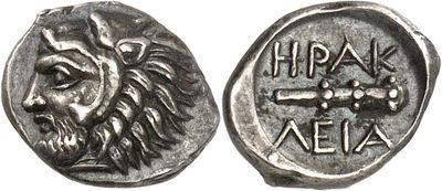 a silver coin with the head of a lion on it