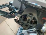 a close up of a car ' s rear end with a motor