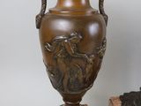 two vases that are sitting next to each other