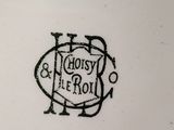 a close up of a plate with a design on it