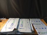 a table that has a bunch of papers on it