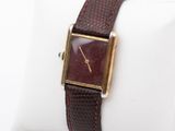an image of a wrist watch with a brown leather band