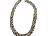 a close up of a necklace on a white background