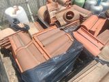 many different types of roofing materials on the ground