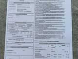 an image of a paper form with a barcode on top of it
