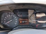 a close up of a car dashboard with a speedometer and gauges
